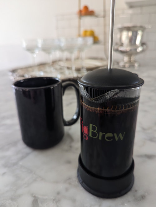 A french press containing FigBrew fig coffee